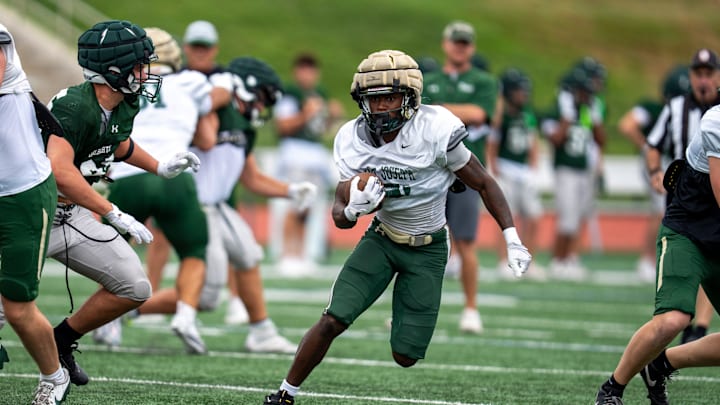 St. Joseph’s Kyshawn Bryant (14) runs with the ball during a combined practice and scrimmage between St. Joseph Regional and Delbarton at Delbarton School in Morristown on Monday, Aug. 18, 2025.