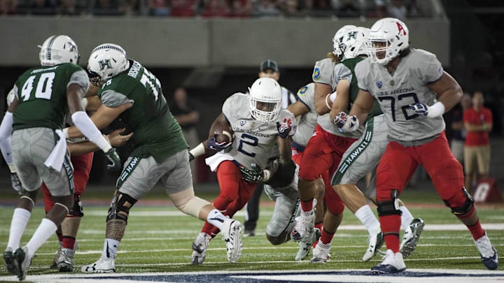 Sep 17, 2016; Tucson, AZ, USA; Arizona Wildcats wide receiver Tyrell Johnson (2) runs the ball against the Hawaii Warriors during the second quarter at Arizona Stadium. Mandatory Credit: Casey Sapio-Imagn Images