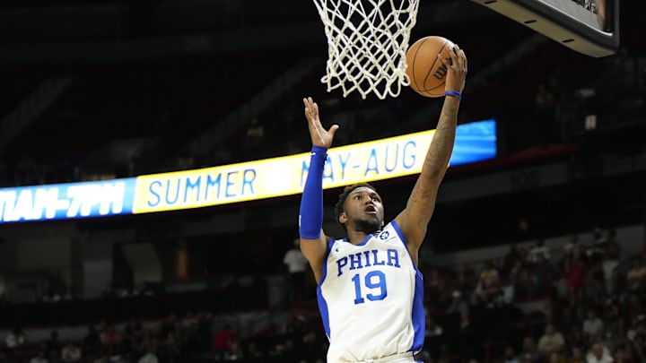 Jul 15, 2024; Las Vegas, NV, USA; Philadelphia 76ers forward Justin Edwards (19) attempts to score a layup against the Portland Trail Blazers during the second half at Thomas & Mack Center. Mandatory Credit: Lucas Peltier-Imagn Images