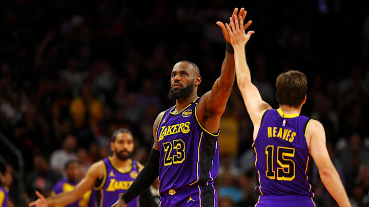 Oct 28, 2024; Phoenix, Arizona, USA; Los Angeles Lakers forward LeBron James (23) celebrates with guard Austin Reaves (15) after a play during the second half against the Phoenix Suns at Footprint Center. Mandatory Credit: Mark J. Rebilas-Imagn Images