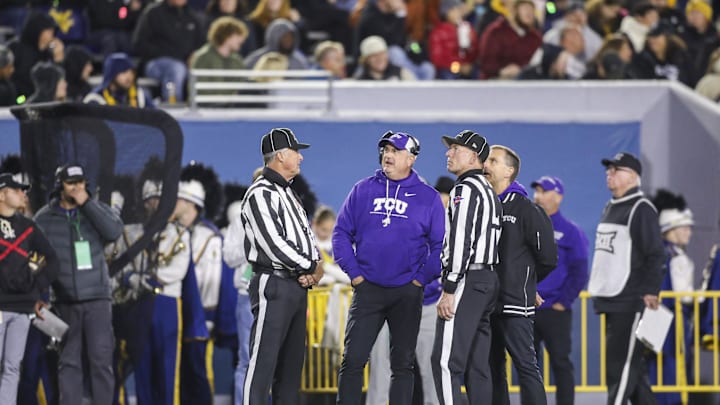 Oct 25, 2025; Morgantown, West Virginia, USA; Texas Christian University Horned Frogs head coach Sonny Dykes talks to officials during the second quarter against the West Virginia Mountaineers at Milan Puskar Stadium. Mandatory Credit: Ben Queen-Imagn Images Oct 25, 2025; Morgantown, West Virginia, USA; Texas Christian University Horned Frogs head coach Sonny Dykes talks to officials during the second quarter against the West Virginia Mountaineers at Milan Puskar Stadium. Mandatory Credit: Ben Queen-Imagn Images