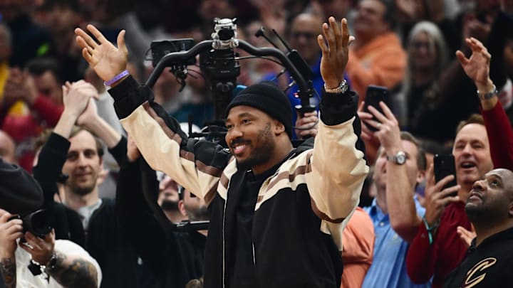 Feb 24, 2026; Cleveland, Ohio, USA; Cleveland Browns player Myles Garrett acknowledges the crowd during the first half of the game between the Cleveland Cavaliers and the New York Knicks at Rocket Arena. Mandatory Credit: Ken Blaze-Imagn Images