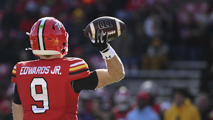 Nov 23, 2024; College Park, Maryland, USA;  Maryland Terrapins quarterback Billy Edwards Jr. (9) throws from the pocket during the first half against the Iowa Hawkeyes at SECU Stadium. Mandatory Credit: Tommy Gilligan-Imagn Images