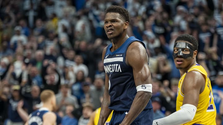Apr 25, 2025; Minneapolis, Minnesota, USA; Minnesota Timberwolves guard Anthony Edwards (5) reacts after making a shoot against the Los Angeles Lakers in the second half during game three of first round for the 2024 NBA Playoffs at Target Center. Mandatory Credit: Jesse Johnson-Imagn Images