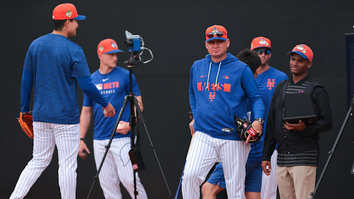 Feb 17, 2026; Port St. Lucie, FL, USA; New York Mets manager Carlos Mendoza (64) watches a bullpen session during spring training at Clover Park. Mandatory Credit: Sam Navarro-Imagn Images Feb 17, 2026; Port St. Lucie, FL, USA; New York Mets manager Carlos Mendoza (64) watches a bullpen session during spring training at Clover Park. Mandatory Credit: Sam Navarro-Imagn Images