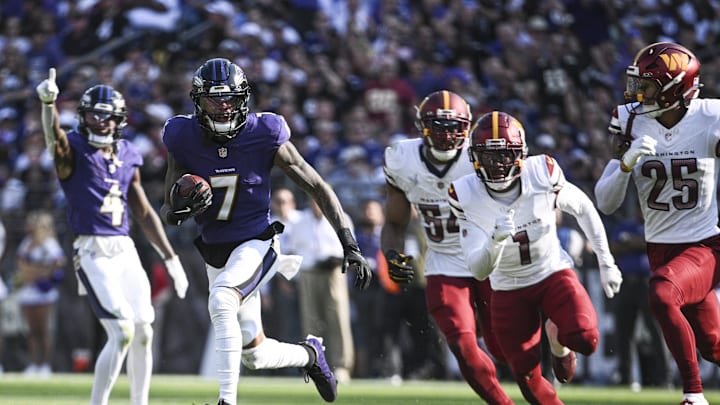 Baltimore Ravens wide receiver Rashod Bateman runs after a catch during the second half against the Washington Commanders.