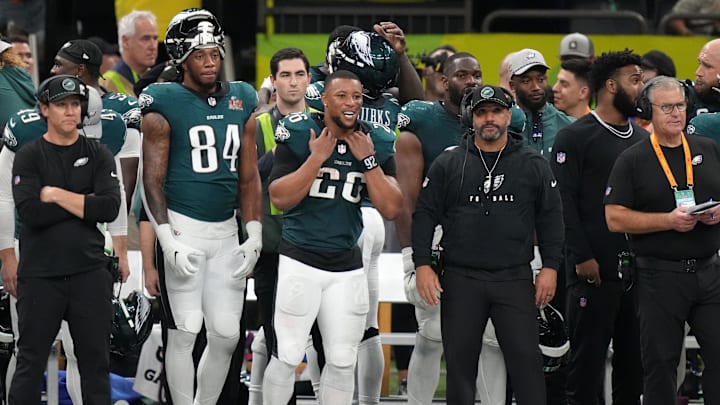 Feb 9, 2025; New Orleans, LA, USA; Philadelphia Eagles running back Saquon Barkley (26) reacts on the sidelines during the fourth quarter against the Kansas City Chiefs in Super Bowl LIX halftime show at Caesars Superdome. 