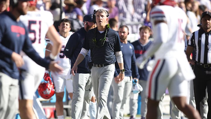 Nov 23, 2024; Fort Worth, Texas, USA; Arizona Wildcats head coach Brent Brennan walks on the sidelines during the game against the TCU Horned Frogs at Amon G. Carter Stadium. Mandatory Credit: Tim Heitman-Imagn Images