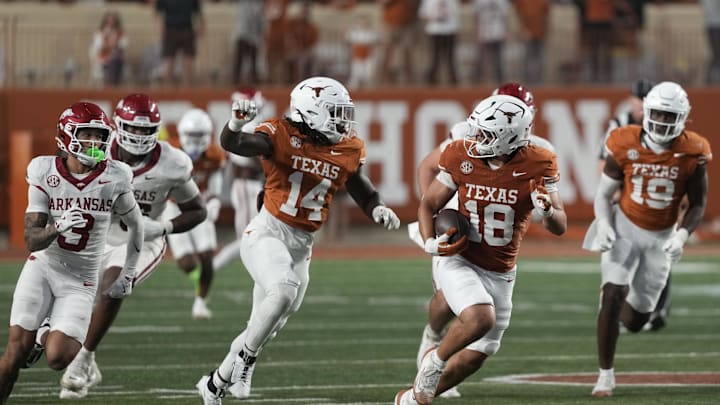 Nov 22, 2025; Austin, Texas, USA; Texas Longhorns linebacker Liona Lefau (18) runs for after recovering a fumble during the second half against the Arkansas Razorbacks at Darrell K Royal-Texas Memorial Stadium. Mandatory Credit: Scott Wachter-Imagn Images Nov 22, 2025; Austin, Texas, USA; Texas Longhorns linebacker Liona Lefau (18) runs for after recovering a fumble during the second half against the Arkansas Razorbacks at Darrell K Royal-Texas Memorial Stadium. Mandatory Credit: Scott Wachter-Imagn Images