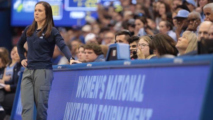 Columbia coach Megan Griffith watches from the baseline during the second half of Saturday's WNIT