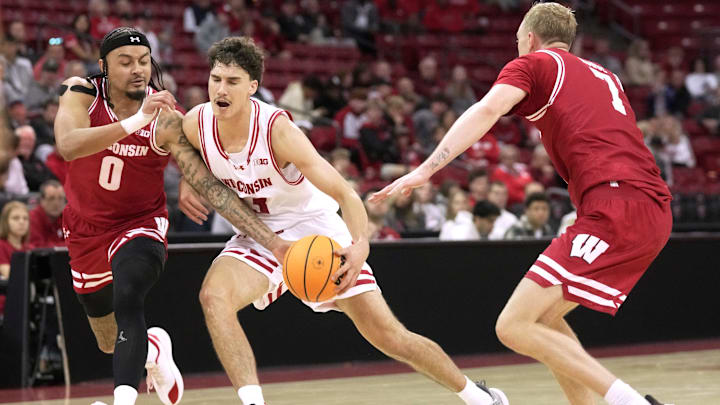Hayden Jones (13) drives on Braeden Carrington (0) during a Wisconsin men’s basketball scrimmage Sunday, October 19, 2025 at the Kohl Center in Madison, Wisconsin.