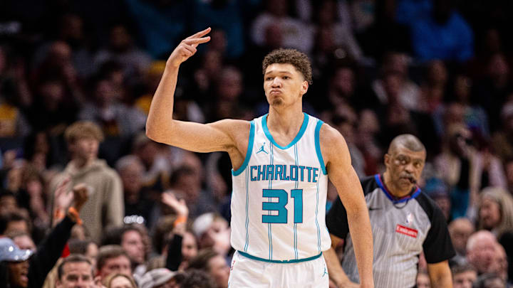 Mar 7, 2025; Charlotte, North Carolina, USA; Charlotte Hornets forward Tidjane Salaun (31) celebrates a three point basket against the Cleveland Cavaliers during the third quarter at Spectrum Center. Mandatory Credit: Scott Kinser-Imagn Images