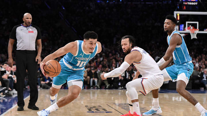 Dec 5, 2024; New York, New York, USA; Charlotte Hornets guard Josh Green (10) drives to the basket while being defended by New York Knicks guard Jalen Brunson (11) during the first half at Madison Square Garden. Mandatory Credit: John Jones-Imagn Images