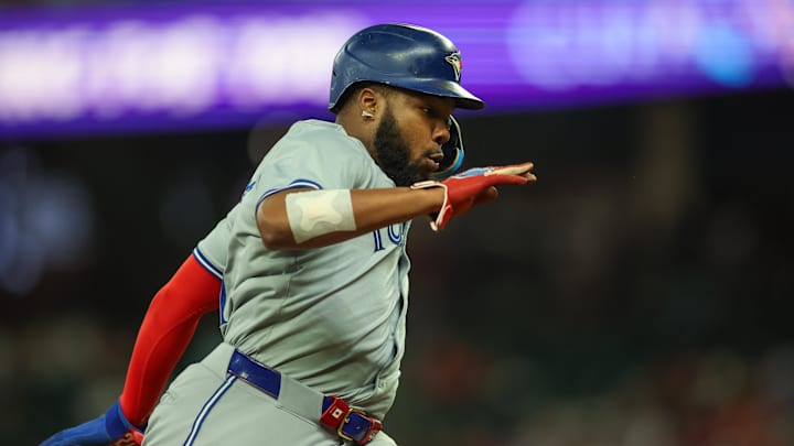 Toronto Blue Jays first baseman Vladimir Guerrero Jr. (27) runs to third against the Atlanta Braves in the ninth inning at Truist Park in 2024. Toronto Blue Jays first baseman Vladimir Guerrero Jr. (27) runs to third against the Atlanta Braves in the ninth inning at Truist Park in 2024.