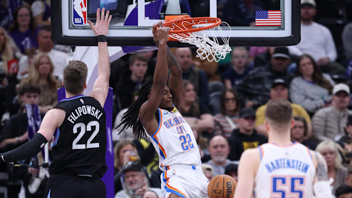 Feb 21, 2025; Salt Lake City, Utah, USA; Oklahoma City Thunder guard Cason Wallace (22) dunks against Utah Jazz forward Kyle Filipowski (22) during the fourth quarter at Delta Center. Mandatory Credit: Rob Gray-Imagn Images Feb 21, 2025; Salt Lake City, Utah, USA; Oklahoma City Thunder guard Cason Wallace (22) dunks against Utah Jazz forward Kyle Filipowski (22) during the fourth quarter at Delta Center. Mandatory Credit: Rob Gray-Imagn Images