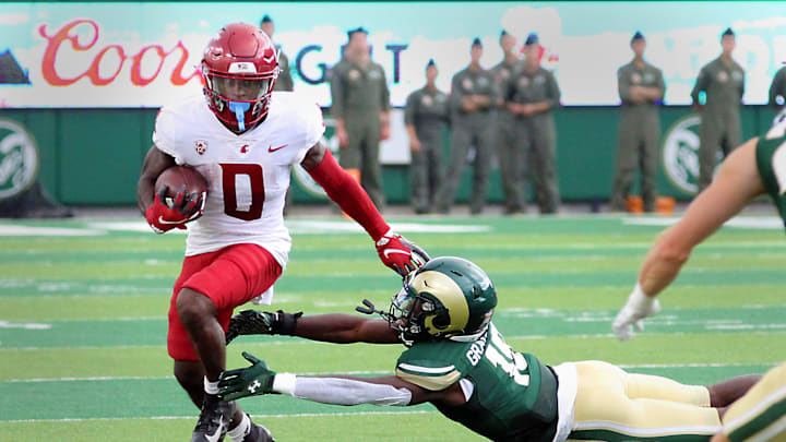 Colorado State's Tyrell Grayson Jr. works to make a diving tackle on Washington State wide receiver DT Sheffield during the first half of the Rams first game of the season on Saturday, Sept. 2, 2023. The Rams were defeated 50-24.