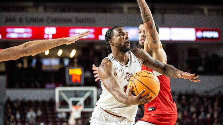 NMSU guard Femi Odukale looks toward the basket during a college basketball game on Thursday, Jan.