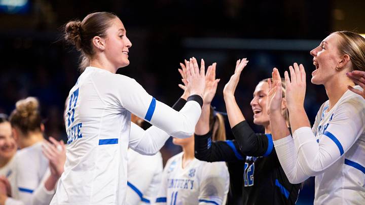 Dec 13, 2025; Lexington, KY, USA; Kentucky Wildcats outside hitter Brooklyn DeLeye (17) high-fives her teammates during player introductions before the match against the Creighton Bluejays at Historic Memorial Coliseum. Mandatory Credit: Arden Barnes-Imagn Images