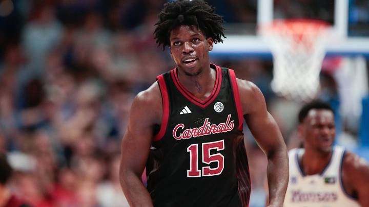 Louisville Cardinals center Obinna Ekezie Jr. (15) looks back after a three-pointer made against Kansas Jayhawks during the exhibition game inside Allen Fieldhouse in Lawrence, Kansas on Oct. 21, 2026. Louisville Cardinals center Obinna Ekezie Jr. (15) looks back after a three-pointer made against Kansas Jayhawks during the exhibition game inside Allen Fieldhouse in Lawrence, Kansas on Oct. 21, 2026.