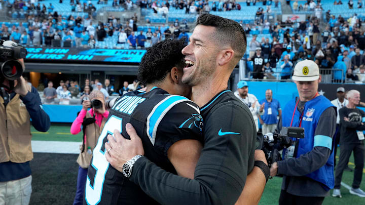 Nov 3, 2024; Charlotte, North Carolina, USA; Carolina Panthers quarterback Bryce Young (9) with head coach Dave Canales after the game at Bank of America Stadium. Mandatory Credit: Bob Donnan-Imagn Images