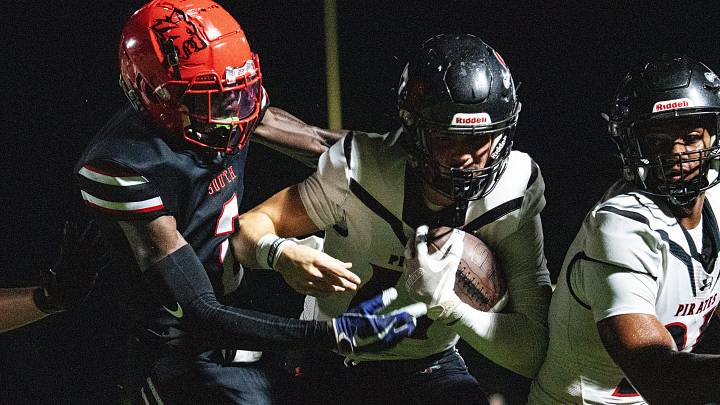 Logan Flaherty,#17, the qurterback for the Port Charlotte football team gains yards at South Fort Myers on Thursday, Sept. 25, 2025.
