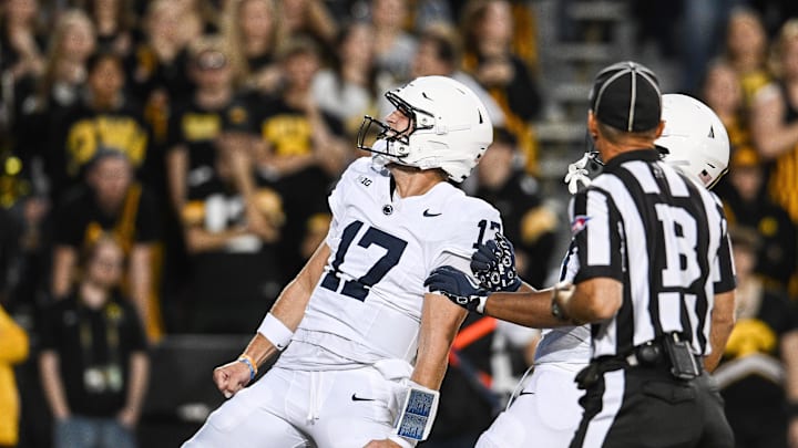 Penn State Nittany Lions quarterback Ethan Grunkemeyer (17) reacts after a touchdown against the Iowa Hawkeyes during the first quarter at Kinnick Stadium. Penn State Nittany Lions quarterback Ethan Grunkemeyer (17) reacts after a touchdown against the Iowa Hawkeyes during the first quarter at Kinnick Stadium.