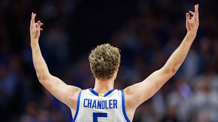Feb 17, 2026; Lexington, Kentucky, USA; Kentucky Wildcats guard Collin Chandler (5) celebrates after scoring a three point basket during the first half against the Georgia Bulldogs at Rupp Arena at Central Bank Center. Mandatory Credit: Jordan Prather-Imagn Images