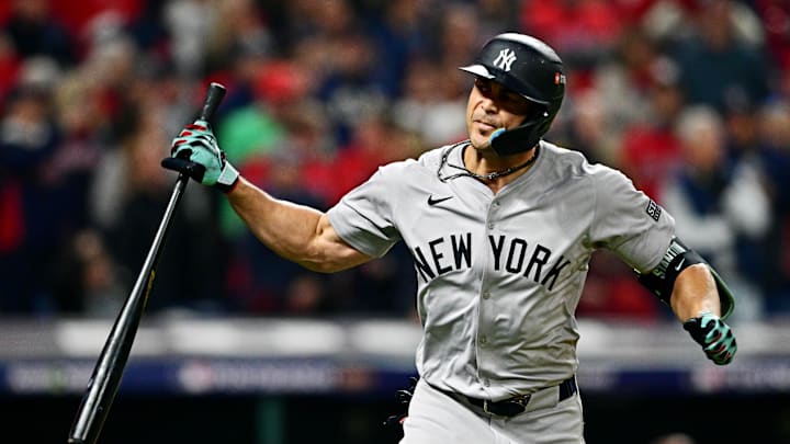 Oct 19, 2024; Cleveland, Ohio, USA; New York Yankees designated hitter Giancarlo Stanton (27) celebrates after hitting a two run home run during the sixth inning against the Cleveland Guardians during game five of the ALCS for the 2024 MLB playoffs at Progressive Field. Mandatory Credit: David Dermer-Imagn Images Oct 19, 2024; Cleveland, Ohio, USA; New York Yankees designated hitter Giancarlo Stanton (27) celebrates after hitting a two run home run during the sixth inning against the Cleveland Guardians during game five of the ALCS for the 2024 MLB playoffs at Progressive Field. Mandatory Credit: David Dermer-Imagn Images