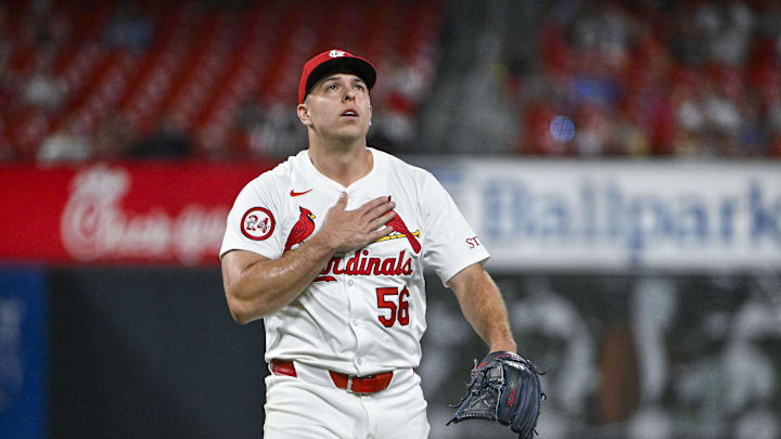 Aug 28, 2024; St. Louis, Missouri, USA;  St. Louis Cardinals relief pitcher Ryan Helsley (56) reacts after striking out San Diego Padres third baseman Manny Machado (not pictured) during the ninth inning at Busch Stadium. Mandatory Credit: Jeff Curry-Imagn Images