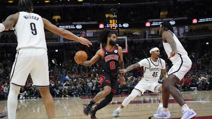 Mar 13, 2025; Chicago, Illinois, USA; Brooklyn Nets guard Keon Johnson (45) defends Chicago Bulls guard Coby White (0) during the first quarter at United Center. Mandatory Credit: David Banks-Imagn Images Mar 13, 2025; Chicago, Illinois, USA; Brooklyn Nets guard Keon Johnson (45) defends Chicago Bulls guard Coby White (0) during the first quarter at United Center. Mandatory Credit: David Banks-Imagn Images