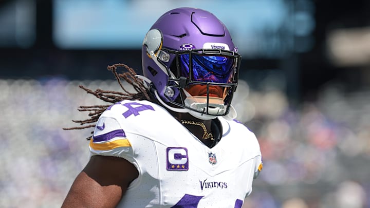 Sep 8, 2024; East Rutherford, New Jersey, USA; Minnesota Vikings safety Josh Metellus (44) runs up field before the game against the New York Giants at MetLife Stadium. Mandatory Credit: Vincent Carchietta-Imagn Images
