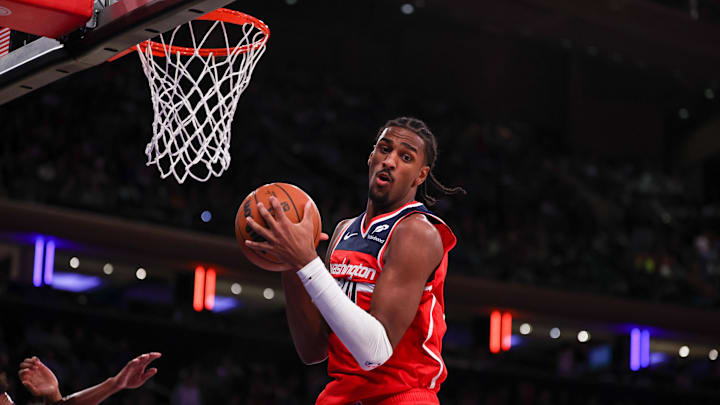 Oct 9, 2024; New York, New York, USA; Washington Wizards forward Alex Sarr (20) rebounds during the second half against the New York Knicks at Madison Square Garden. Mandatory Credit: Vincent Carchietta-Imagn Images