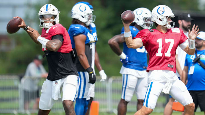Indianapolis Colts quarterback Anthony Richardson Sr. (5) and quarterback Daniel Jones (17) throw the ball Thursday, Aug. 14, 2025, at a joint practice with the Green Bay Packers during training camp at Grand Park in Westfield.