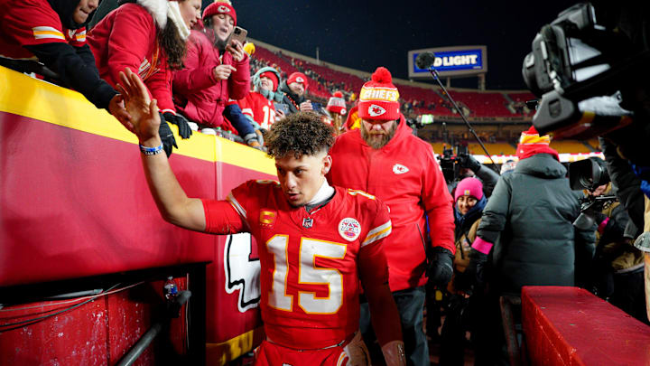 Jan 18, 2025; Kansas City, Missouri, USA; Kansas City Chiefs quarterback Patrick Mahomes (15) shakes hands with fans after defeating the Houston Texans in a 2025 AFC divisional round game at GEHA Field at Arrowhead Stadium. Mandatory Credit: Denny Medley-Imagn Images