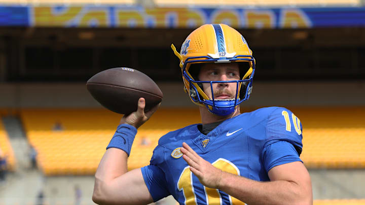 Sep 6, 2025; Pittsburgh, Pennsylvania, USA;  Pittsburgh Panthers quarterback Eli Holstein (10) warms up against the Central Michigan Chippewas at Acrisure Stadium. Mandatory Credit: Charles LeClaire-Imagn Images