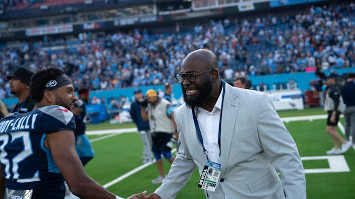 Tennessee Titans General Manager Ran Carthon celebrates with Tennessee Titans cornerback Gabe Jeudy-Lally (32) after his team's overtime 20-17 win against the New England Patriots at Nissan Stadium in Nashville, Tenn., Sunday, Nov. 3, 2024.