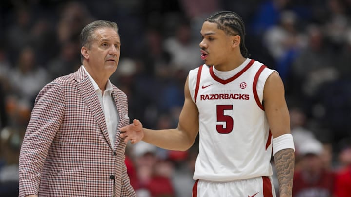 Arkansas Razorbacks head coach John Calipari talks with guard Darius Acuff Jr.