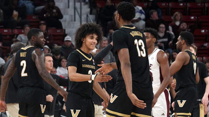Jan 24, 2026; Starkville, Mississippi, USA; Vanderbilt Commodores guard Tyler Tanner (3) reacts with center Jalen Washington (13) during the second half against the Mississippi State Bulldogs at Humphrey Coliseum. Mandatory Credit: Petre Thomas-Imagn Images