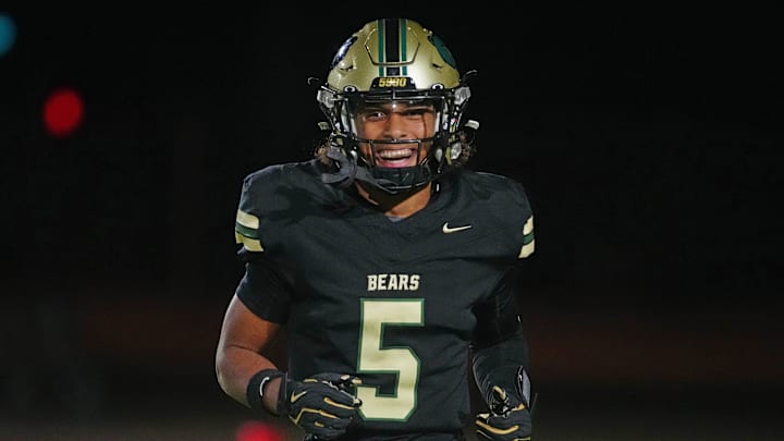 Basha receiver Gio Richardson (5) smiles against ALA Queen Creek during an Open Semifinal game at Dobson High School on Nov. 30, 2024.
