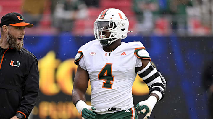 Nov 1, 2025; Dallas, Texas, USA;  SMU Miami Hurricanes defensive lineman Rueben Bain Jr. (4) warms up before the game against the SMU Mustangs at Gerald J. Ford Stadium. Mandatory Credit: Jerome Miron-Imagn Images