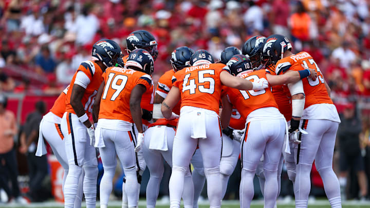 Sep 22, 2024; Tampa, Florida, USA; Denver Broncos quarterback Bo Nix (10) leads a huddle against the Tampa Bay Buccaneers in the first quarter at Raymond James Stadium. Mandatory Credit: Nathan Ray Seebeck-Imagn Images