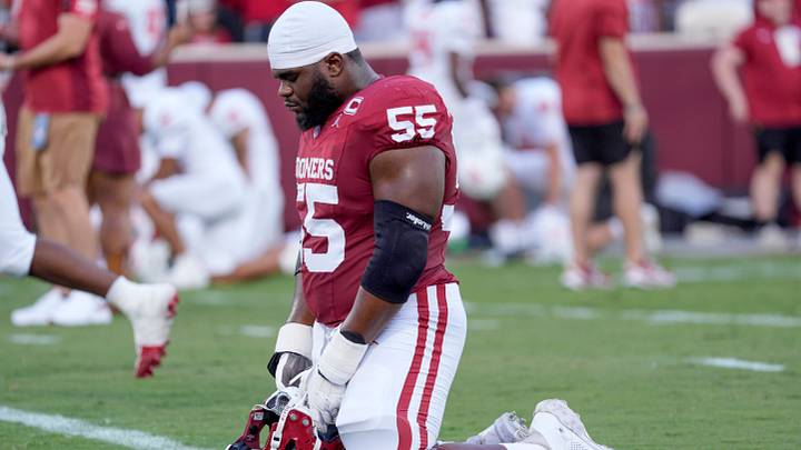 Oklahoma Sooners offensive lineman Eddy Pierre-Louis (55) prays before a college football game between the University of Oklahoma Sooners (OU) and the New Mexico Lobos at Gaylord Family-Oklahoma Memorial Stadium in Norman, Okla., Saturday, Sept. 19, 2026. Oklahoma won 14-6.