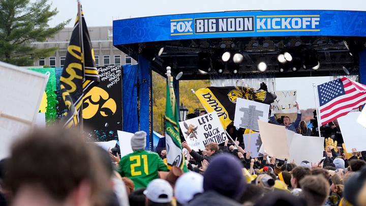 Hawkeye and Oregon fans gather for FOX’s Big Noon Kickoff Nov. 8, 2025 in front of the Old Capitol Building on the University of Iowa Campus in Iowa City, Iowa.