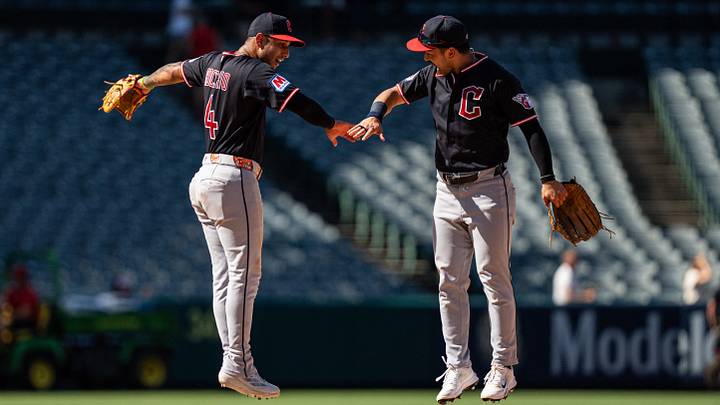 Aug 26, 2026; Anaheim, California, USA;  Cleveland Guardians shortstop Brayan Rocchio (4) and left fielder Steven Kwan (38) celebrate a victory against the Los Angeles Angels at Angel Stadium.  Mandatory Credit: Jon Endow-Imagn Images