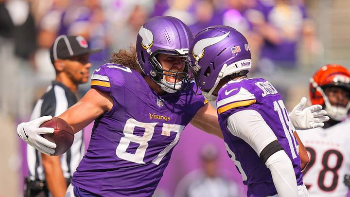 Sep 21, 2025; Minneapolis, Minnesota, USA; Minnesota Vikings tight end TJ. Hockenson (87) reacts with wide receiver Justin Jefferson (18) after catching a touchdown pass against the Cincinnati Bengals during the second half at U.S. Bank Stadium. Mandatory Credit: Brad Rempel-Imagn Images Sep 21, 2025; Minneapolis, Minnesota, USA; Minnesota Vikings tight end TJ. Hockenson (87) reacts with wide receiver Justin Jefferson (18) after catching a touchdown pass against the Cincinnati Bengals during the second half at U.S. Bank Stadium. Mandatory Credit: Brad Rempel-Imagn Images