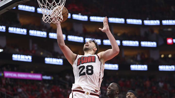 May 4, 2025; Houston, Texas, USA; Houston Rockets center Alperen Sengun (28) shoots the ball as Golden State Warriors forward Draymond Green (23) defends during game seven of the first round for the 2025 NBA Playoffs at Toyota Center. Mandatory Credit: Troy Taormina-Imagn Images May 4, 2025; Houston, Texas, USA; Houston Rockets center Alperen Sengun (28) shoots the ball as Golden State Warriors forward Draymond Green (23) defends during game seven of the first round for the 2025 NBA Playoffs at Toyota Center. Mandatory Credit: Troy Taormina-Imagn Images