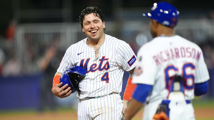Aug 17, 2025; Williamsport, Pennsylvania, USA; New York Mets catcher Francisco Alvarez (4) reacts after hitting a single against the Seattle Mariners in the fifth inning at Journey Bank Ballpark at Historic Bowman Field. Mandatory Credit: Kyle Ross-Imagn Images
