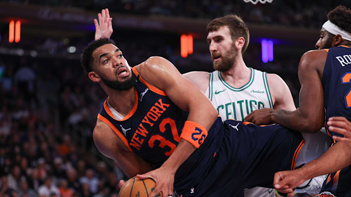 New York Knicks center Karl-Anthony Towns falls out of bounds after a rebound as Boston Celtics center Luke Kornet defends. Mandatory Credit: Vincent Carchietta-Imagn Images New York Knicks center Karl-Anthony Towns falls out of bounds after a rebound as Boston Celtics center Luke Kornet defends. Mandatory Credit: Vincent Carchietta-Imagn Images