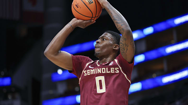 Nov 9, 2024; Houston, Texas, USA; Florida State Seminoles guard Chandler Jackson (0) shoots the ball during the first half against the Rice Owls at Toyota Center. Mandatory Credit: Troy Taormina-Imagn Images
