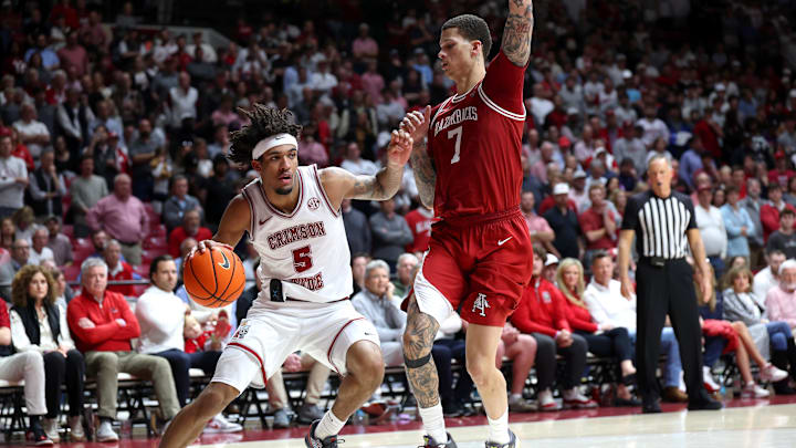 Feb 18, 2026; Tuscaloosa, Alabama, USA; Arkansas Razorback forward Trevon Brazile (7) guards Alabama Crimson Tide forward Amari Allen (5) during the second half at Coleman Coliseum. Mandatory Credit: David Leong-Imagn Images Feb 18, 2026; Tuscaloosa, Alabama, USA; Arkansas Razorback forward Trevon Brazile (7) guards Alabama Crimson Tide forward Amari Allen (5) during the second half at Coleman Coliseum. Mandatory Credit: David Leong-Imagn Images